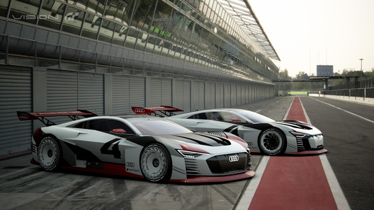 De Audi Vision Gran Turismo (voor) en de Audi e-tron Vision Gran Turismo (achter).